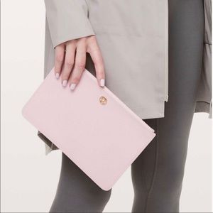 Lululemon Pink Clutch Wristlet Gold Logo Water Resistant Wipes Clean Goody Bag